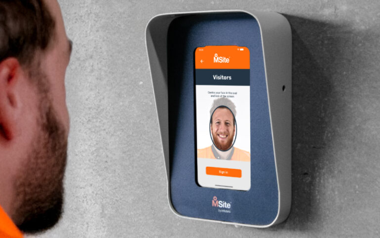 a visitor signing in onsite via an msite face mini