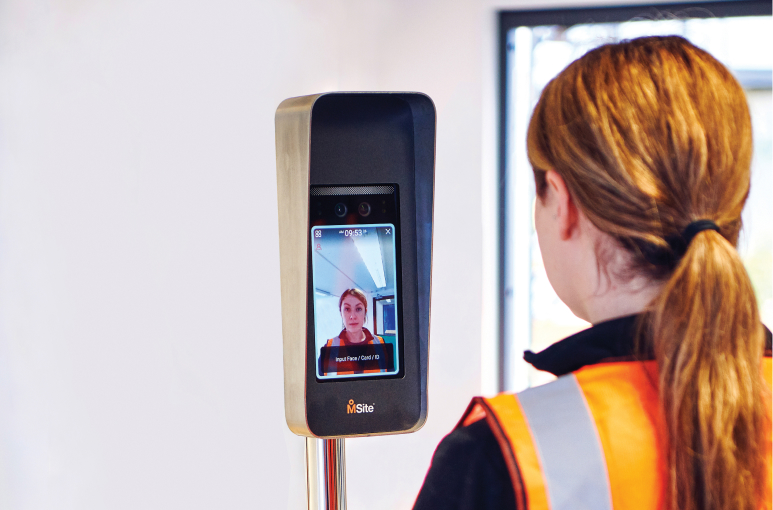 construction worker signing in with face mini device onsite