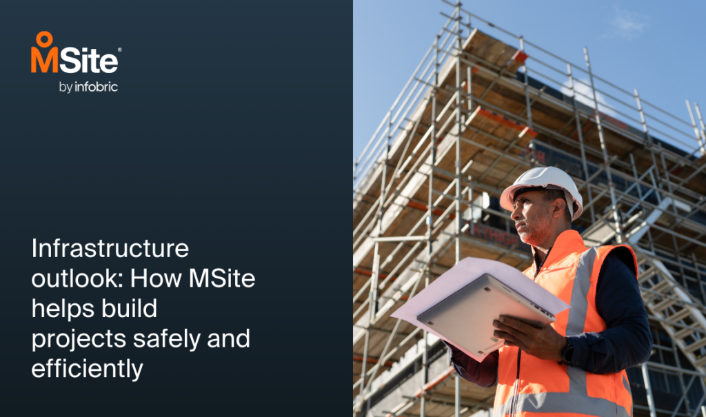 construction manager on site with his laptop